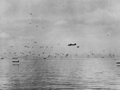 Low flying G4M Betty bombers making a torpedo run against the American Guadalcanal-Tulagi invasion force August 8, 1942