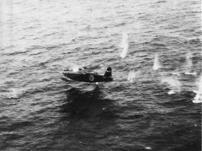 H8K under fire from PB4Y of VPB-117