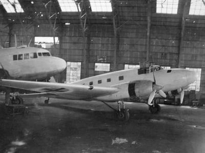 White L2D4 and Mitsubishi Ki-57 with surrender crosses