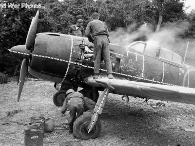 Captured Ki-84 on fire after strafing. Okinawa