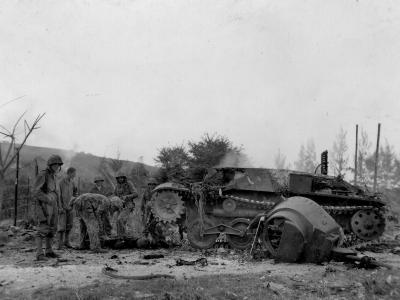 Ha Go Japanese tank after direct hit by 75mm halftrack 1944
