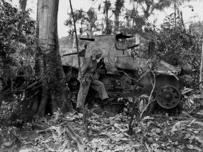 Ha Go Light Tank blown off on Saipan 1944