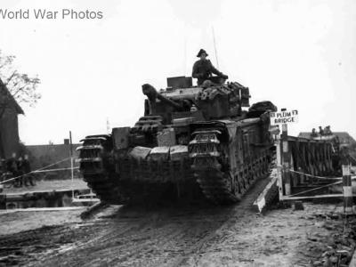 Churchill infantry tank crossing a Bailey bridge