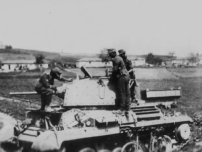 Gebirgsjagers examining Abandoned A10 tank