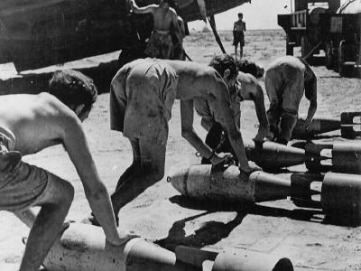 armorers loading bombs