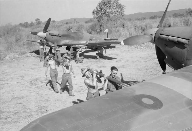 Armourers fit rocket projectiles to Hurricane