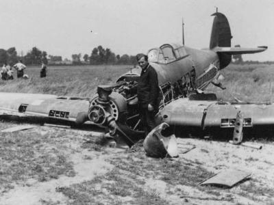 German soldier poses with destroyed Hurricane