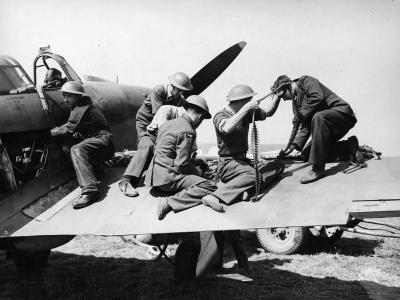 Ground staff re arm a Hurricane Mk I of No 32 Squadron at Biggin Hill August 1940
