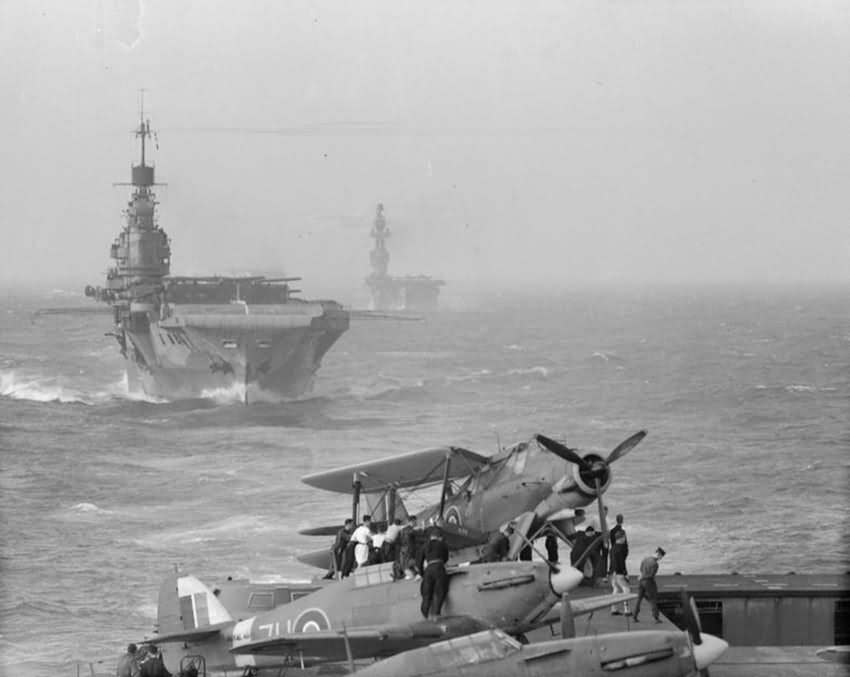HMS Victorious flight deck showing HMS Indomitable and Eagle Sea Hurricane and Albacore are ranged on flight deck August 1942