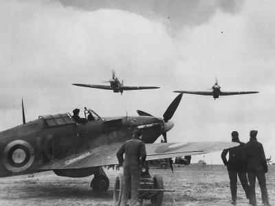 No. 71 Eagle Squadron Hurricanes make a low pass over a XR-K at Kirton-in-Lindsey in 1941