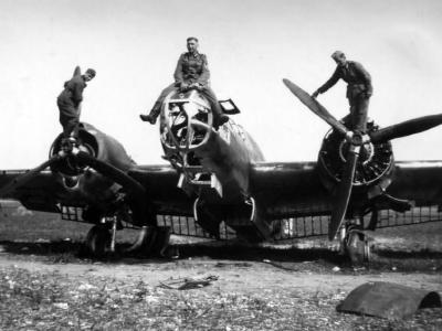 German soldiers poses atop a Martin 167A-3 – 1940