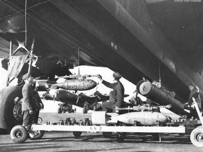 Ground crewman hoist bomb 2