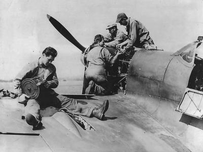 31st FG 309th FS mechanics maintain Spitfire