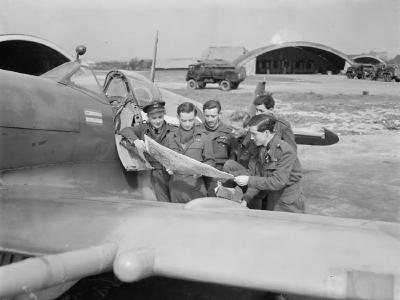 Pilots of No 132 Squadron RAF with their Squadron Leader Alan Page. Spitfire LF Mk IX at Ford, 27 April 1944