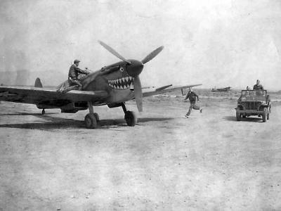 USAAF 31st FG, 307th FS pilot rushes to shark-mouthed Spitfire Mk V at La Seni 1943