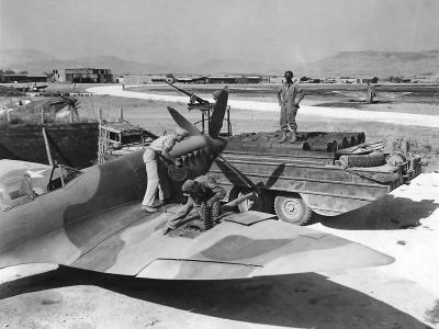 DUKW brings gas to refuel Spitfire. Pilot Robert Rahn, 309th FS, 31st Fighter Group at Sicily 1943