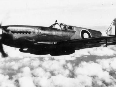 Spitfire Mk XIVe serial RB140 in flight, 1943