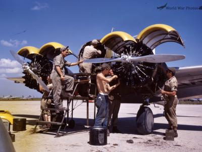 Mechanics Working on AT-9 engines