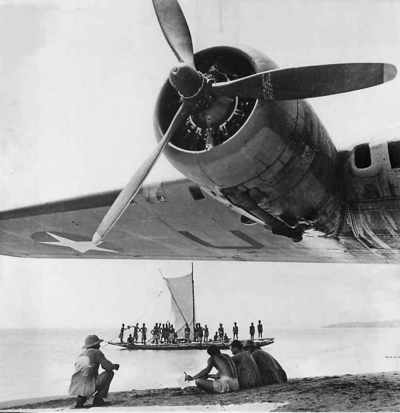 Natives help B-17 Flying Fortress crew forced down after Rabaul Raid, New Guinea