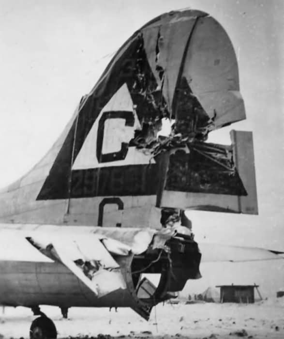 Damaged tail B-17 42-97861 Iza Vailable III 303rd Bomb Group 360th Bomb Squadron 1945
