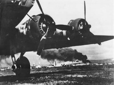 Lt Barthelmess B-17E lands safely at Hickam during Japanese attack on Pearl Harbor
