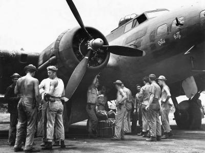 Crew loading supplies on B-17E Bitch Kitty on Guadalcanal