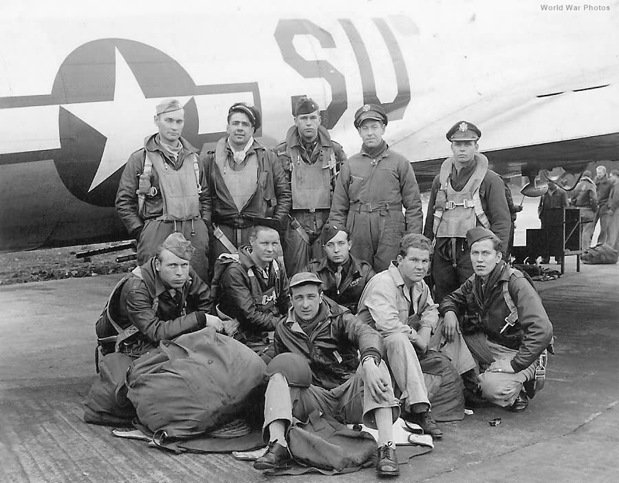 Aircrew of 384th BG, 544th BS in flight gear posed by their B-17