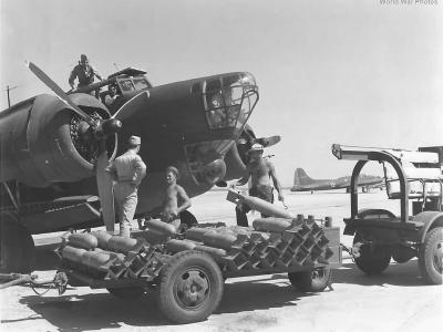 459th Ordnance Company men load B-18 with 100-pound practice bombs at Midland Bombardier School
