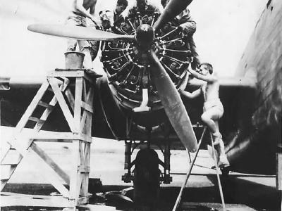 Mechanics checking the engine of a B-18 at a base in the Caribbean 1942