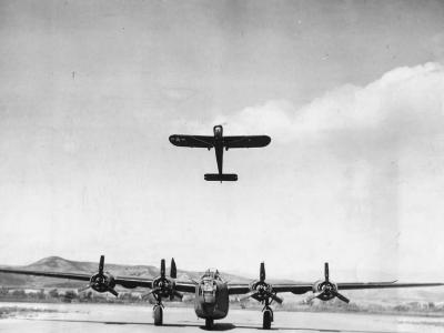 Stinson L-5 Sentinel Flying Jeep over B-24 Liberator