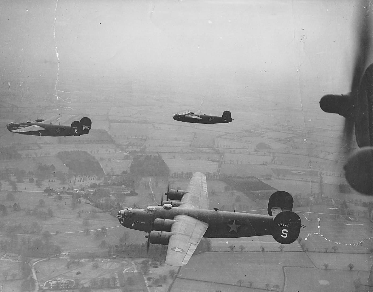 44th BG B-24D Liberators Flying in Formation 41-23774