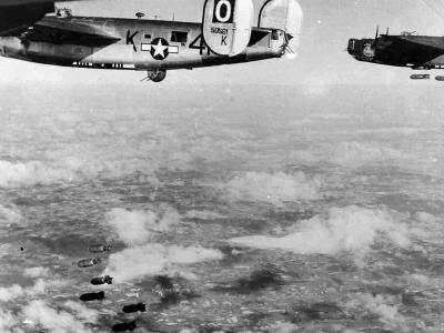 B-24J serial 42-50561 of the 486th Bomb Group, 833rd BS code 4N-K, dropping bombs