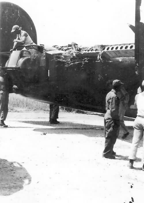 B-24 Liberator with Heavy Battle Damage to Tail Section