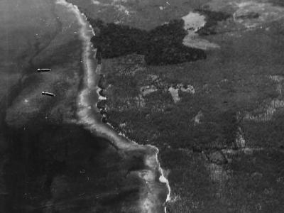 Bombs Fall from VMB-413 B-25 over Rabaul