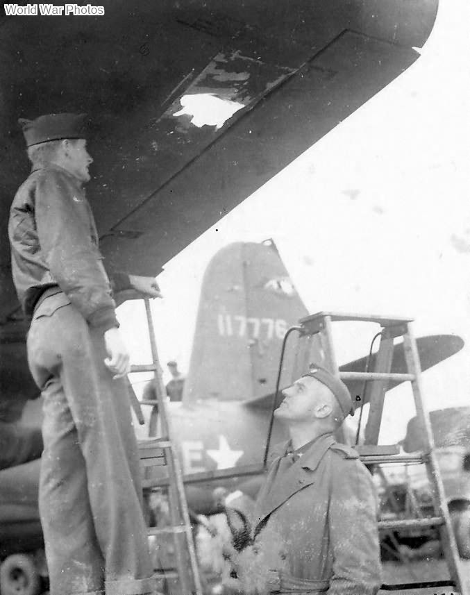 Inspection of Flak damage to 320th BG B-26 41-17776 „Most Likely”