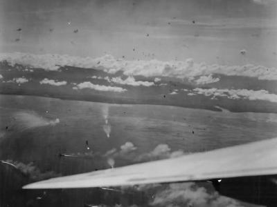 B-24 of 307th and 5th BG escorted by P-38s attack ships of the Japanese fleet in Brunei Bay Harbor 1944