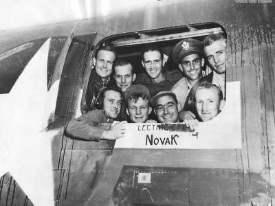 Crew of B-24D 41-24183 „The Goon” lean from the waist gun hatch upon return to their base in China 1943