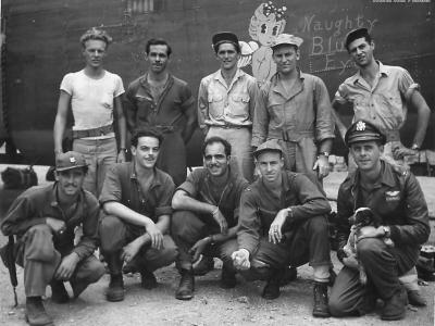 Crew poses beside B-24 42-72797 Naughty Blue Eyes