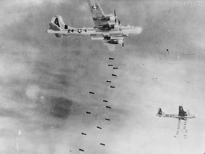 B-29 of the 497th BG dropping bombs on Japan