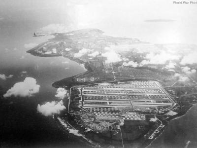 Lone B-29 over base at Tinian Island
