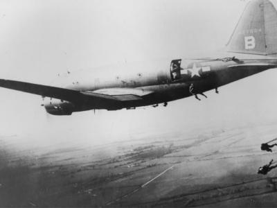 Paratroopers jumping from C-46 44-77524 of the 437th TCG
