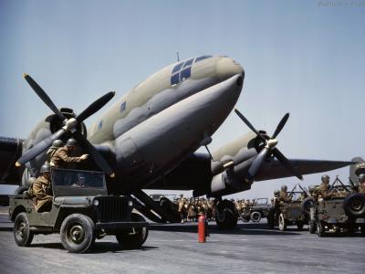 Soldiers waiting to board the C-46A