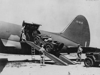 Loading Jeep onto C-46A 41-5163