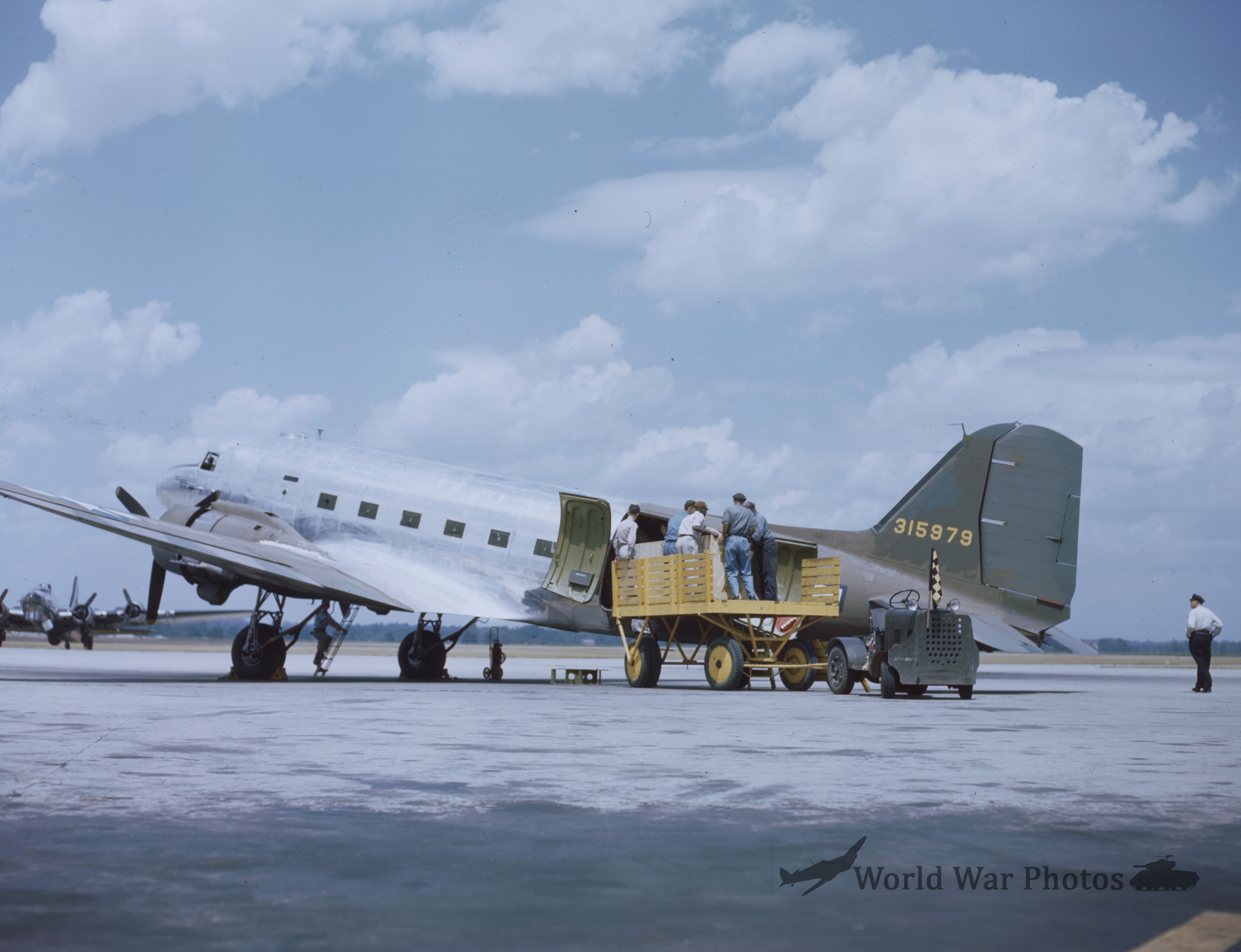 Cargo is Loaded Into a C-47 43-15979
