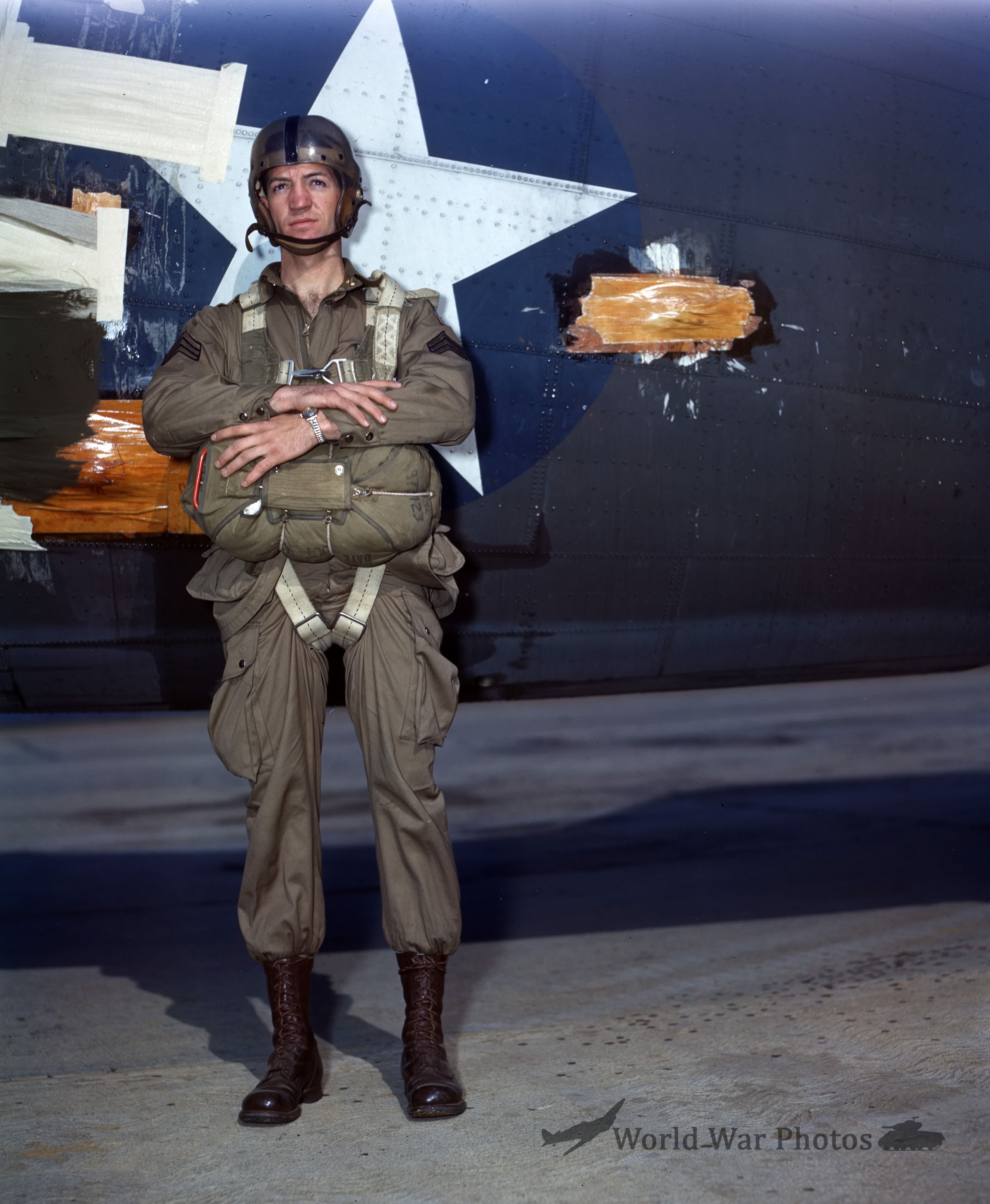 Paratrooper with full equipment in front C-47