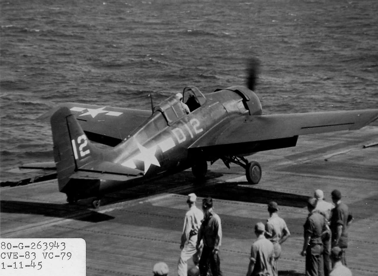 FM-2 Wildcat code D12 of VC-79 on the the flight deck of the escort carrier USS Sargent Bay CVE-83 – 11 January 1945