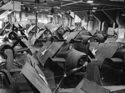Wildcats packed on the hangar deck of the carrier USS Charger (ACV-30) 1942