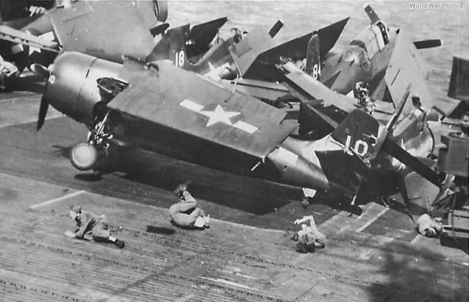 Crewmen on carrier knocked down by runaway Wildcat 1945 2