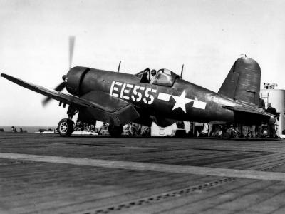 F4U-1D Corsair code EE55 of VMF-512 on a catapult ready to launch from the USS Gilbert Islands CVE-107 – March 6, 1945