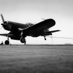 F4U-1D Corsair of VBF-83 catches a wire on board the carrier USS Essex CV-9 1945